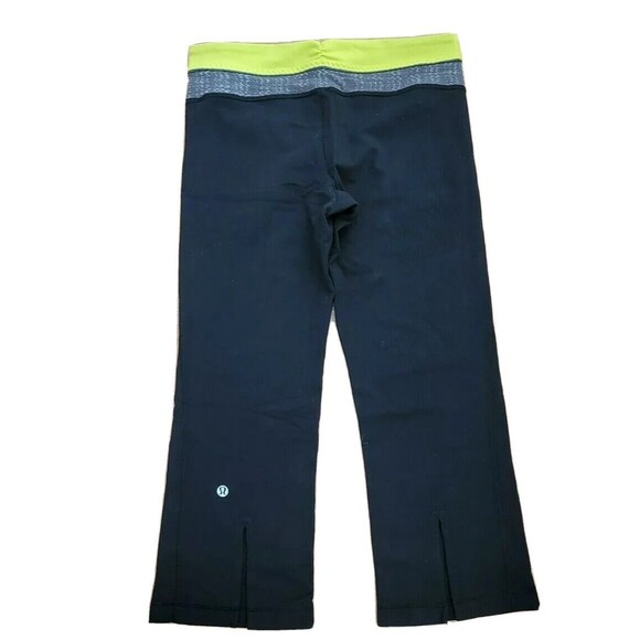 CLEARANCE!!! 💥 Lululemon Size 6 Black Slit Back Flared Yoga Capri Pants - Picture 2 of 11